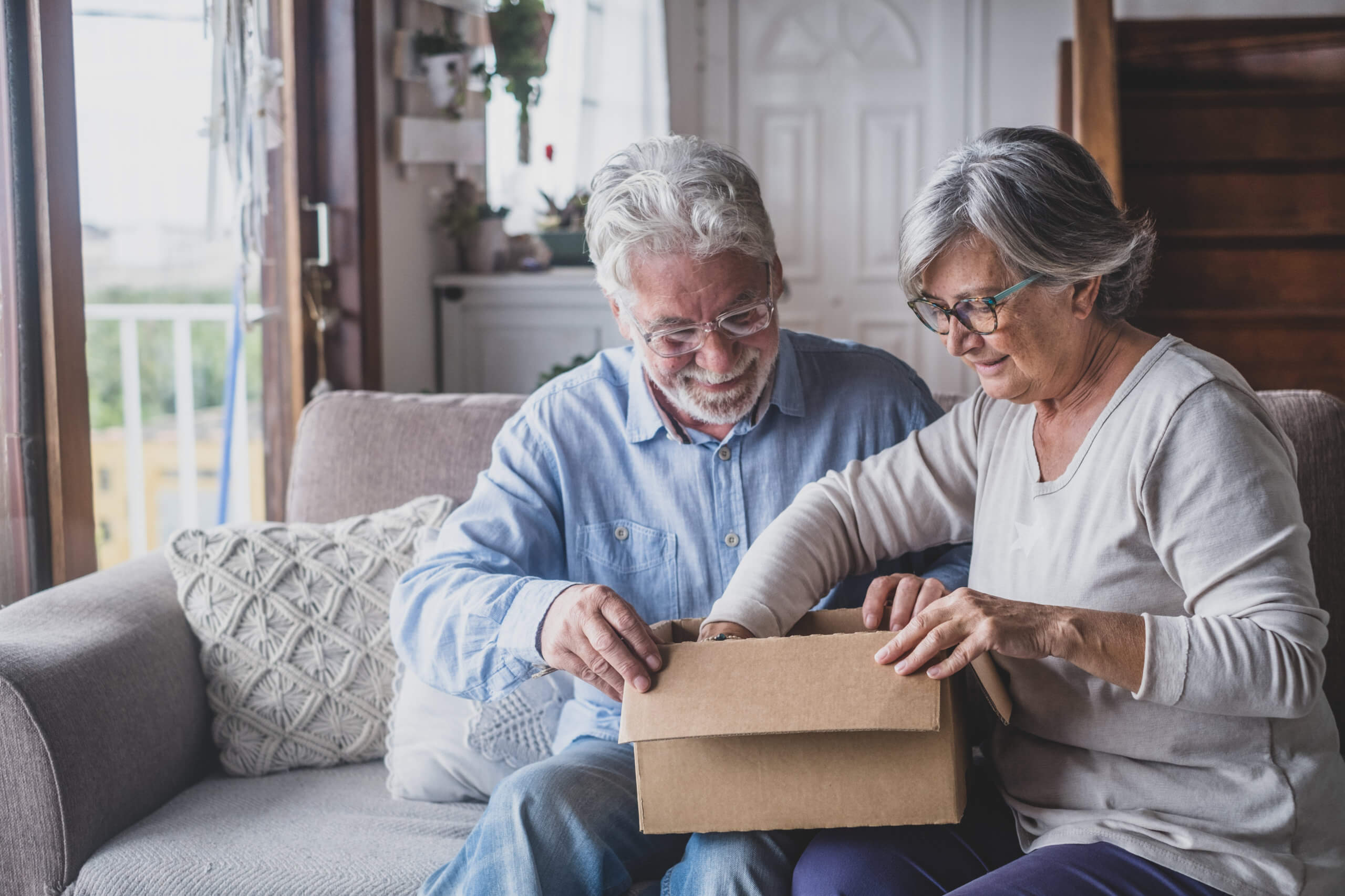 An old couple opens a box